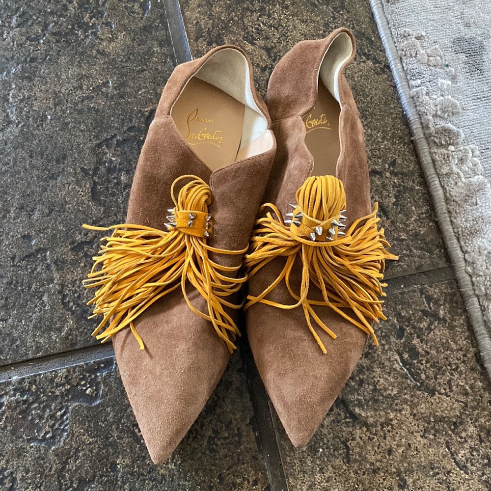 Louboutin and unworn.